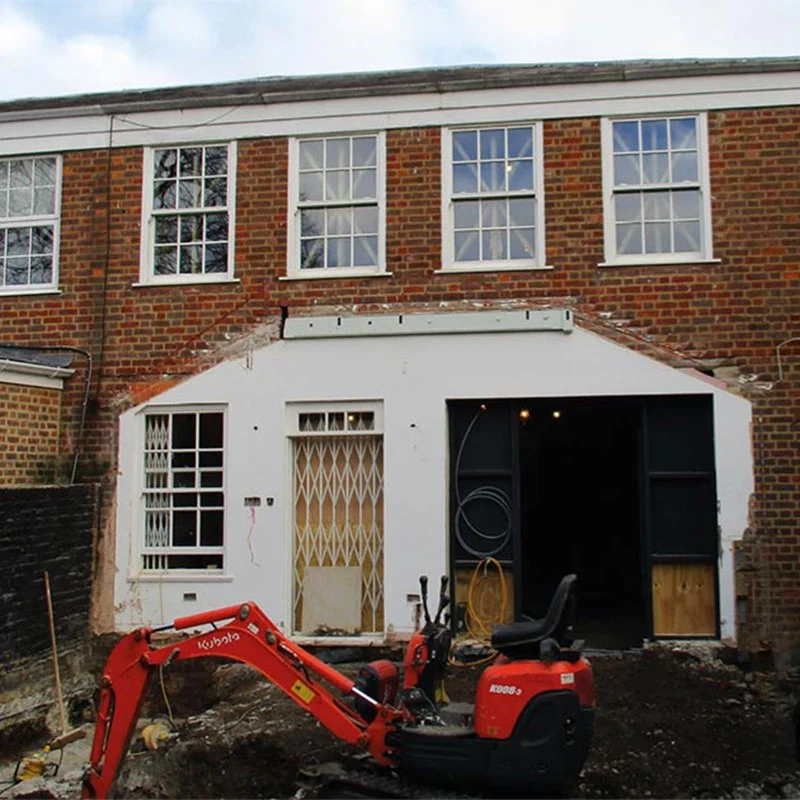 Before picture of house without sunroom