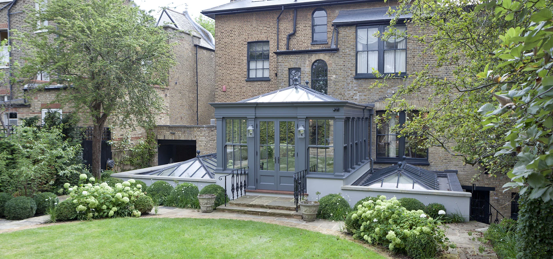 A dual level bespoke orangery with rooflights in a London townhouse