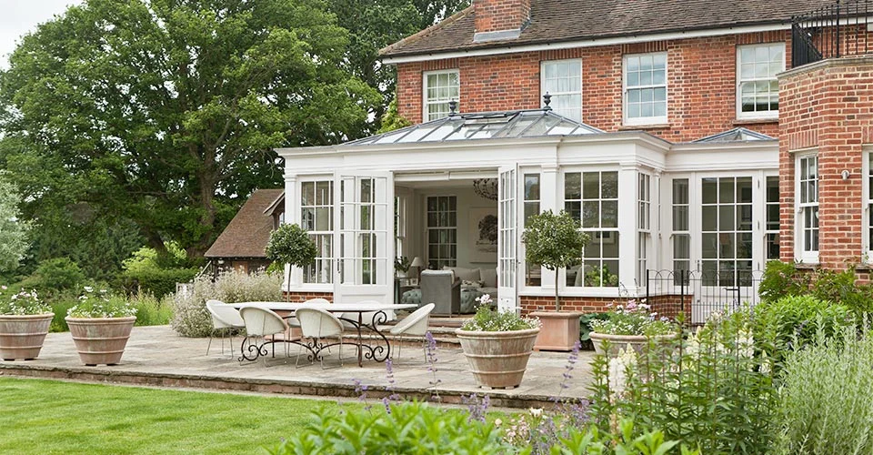Bespoke orangery with an additional side extension