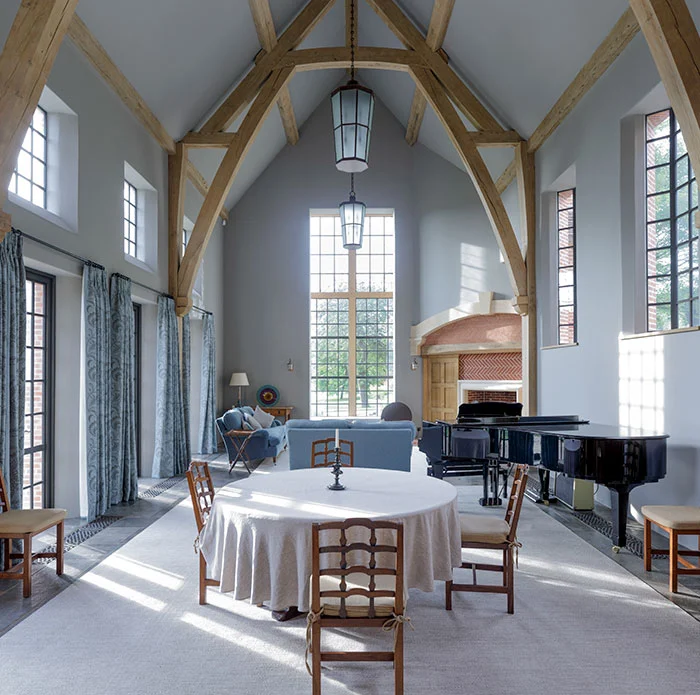 Interior view of a large room complemented with bronze windows