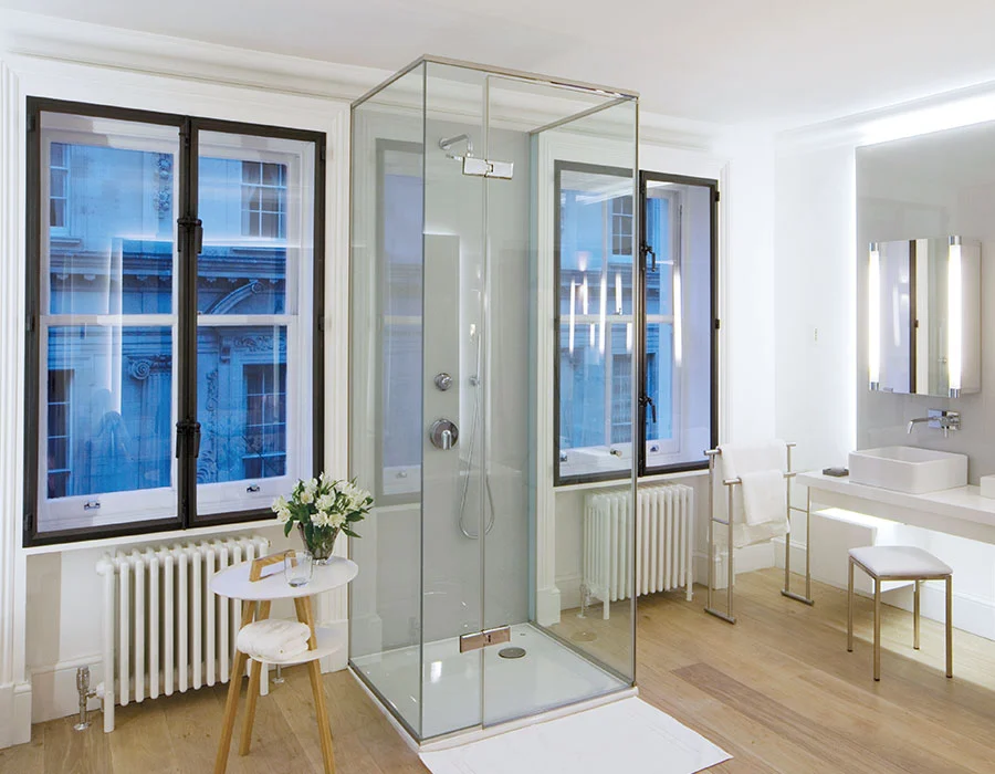 Bronze used as secondary glazing in a bathroom