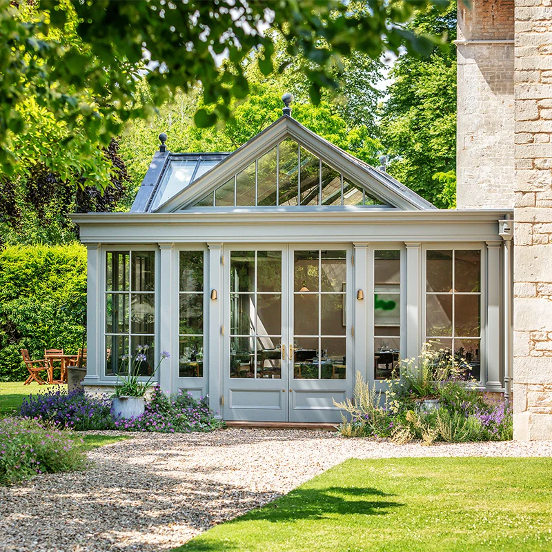 Close up of listed hotel building with conservatory extension