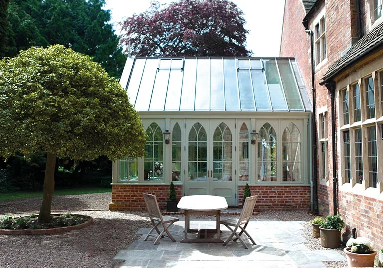 Conservatory opening out to outside dining area