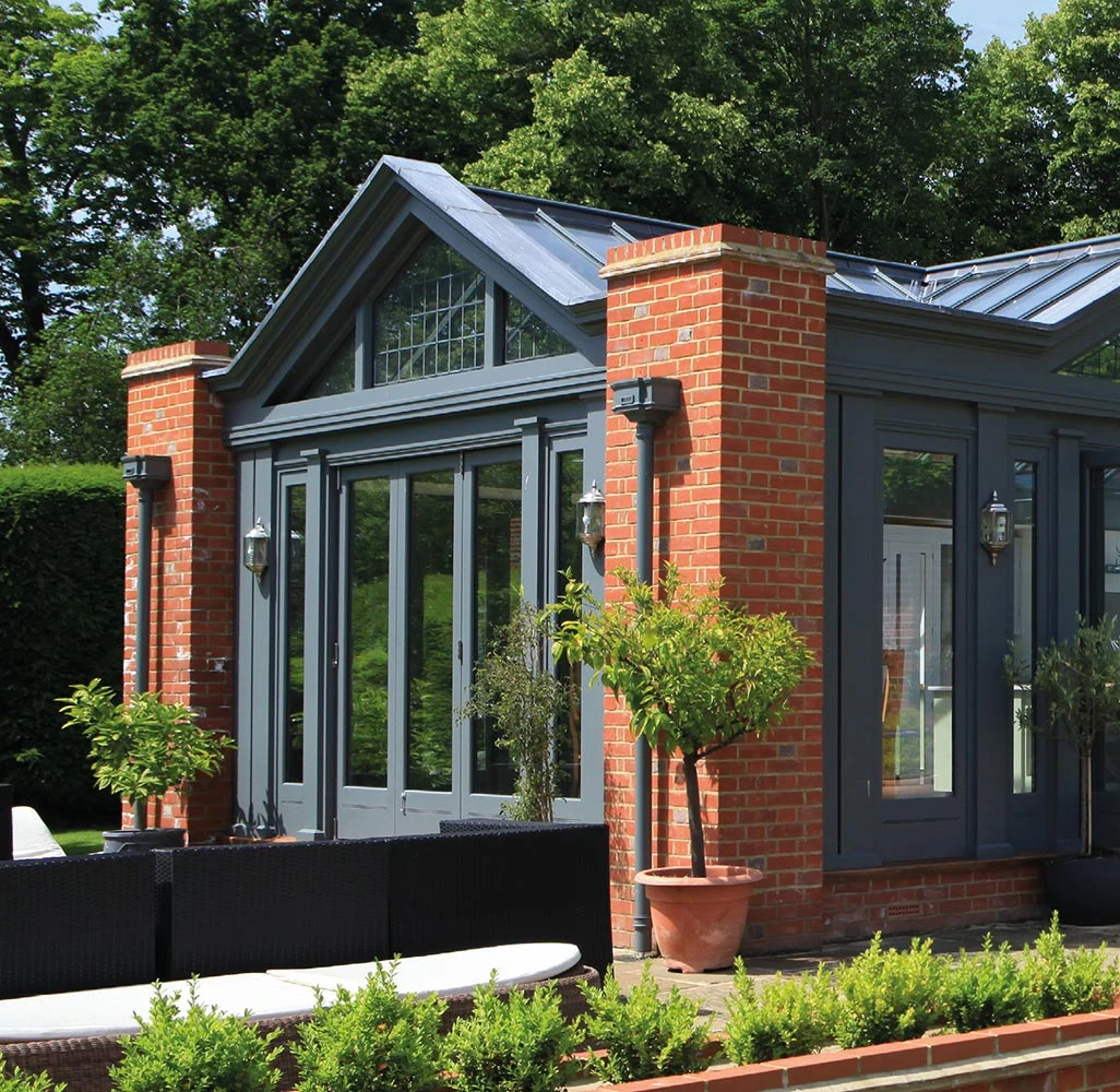 Conservatory with solid red brick piers