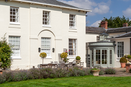 Curved conservatory makes the most of an unused corner courtyard