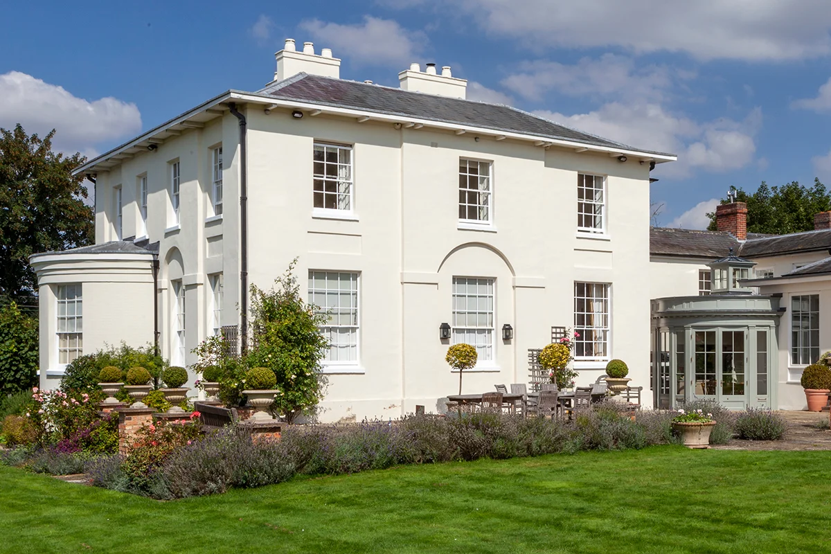 Curved orangery design on listed Georgian house