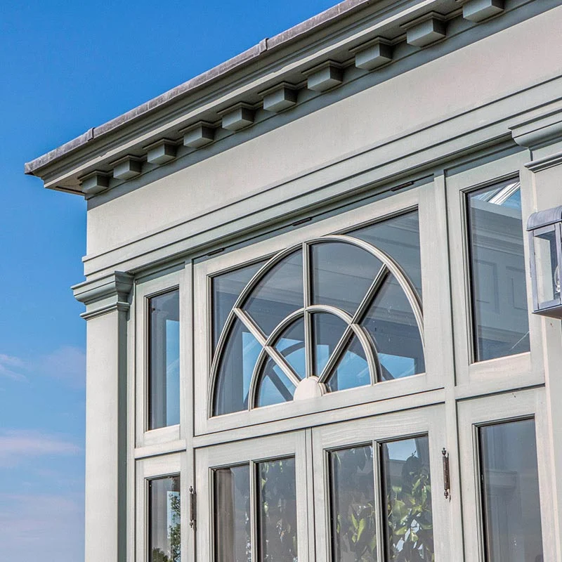 Decorative fanlight detail and dentil moulding