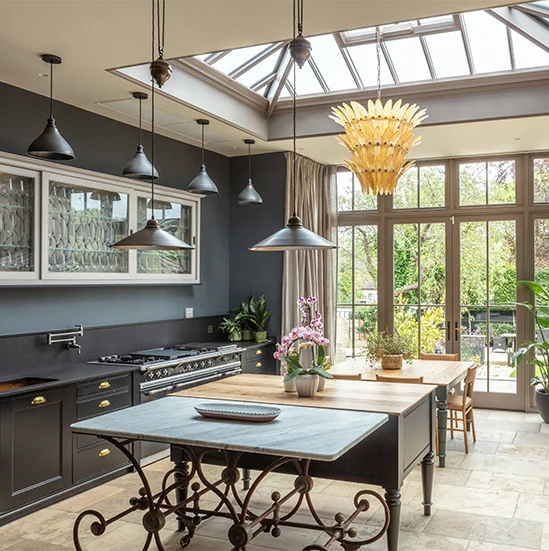 Example of kitchen orangery with a solid wall for units