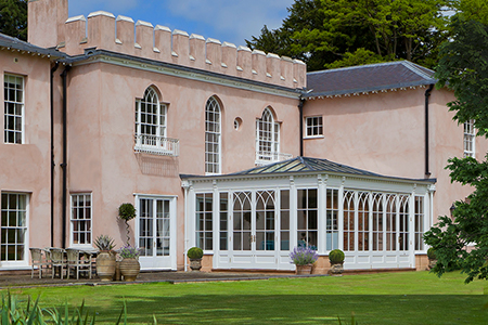 An orangery in Surrey reflects the period details on the existing property