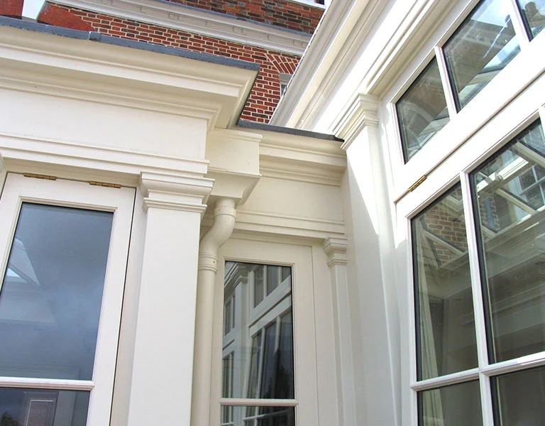 View of the entablature and inset guttering system