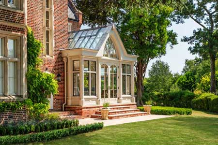 Bespoke Victorian Gothic orangery includes an intriguing combination of materials and detail