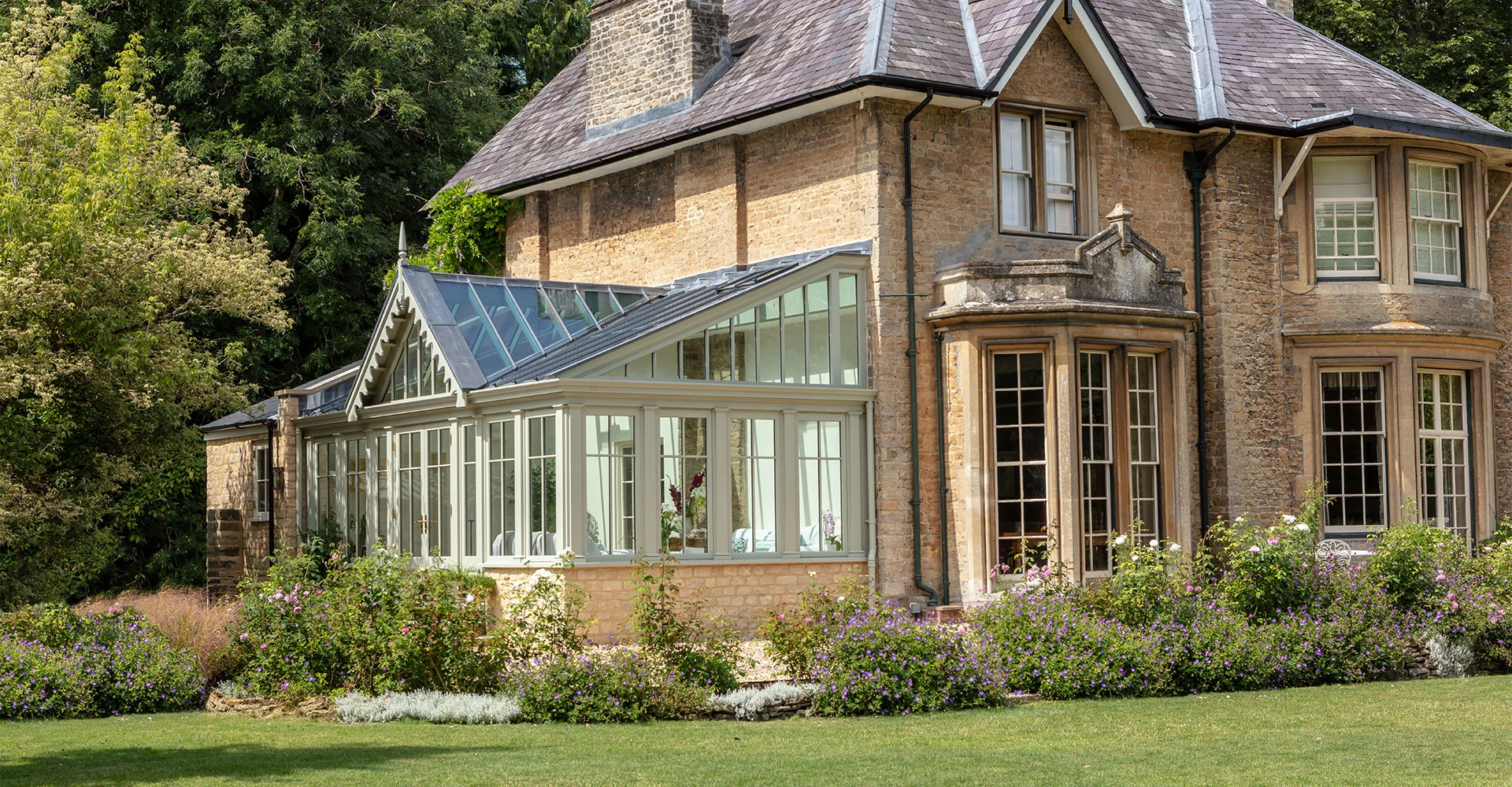 Orangery with black stylish bar incorporated