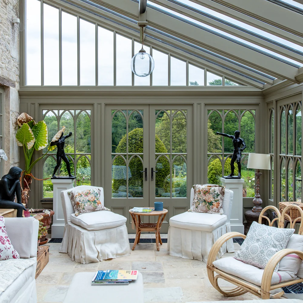 sitting room inside a lean-to conservatory