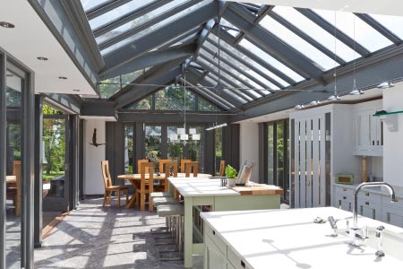 Contemporary conservatory kitchen extension provides a contrast to other rooms