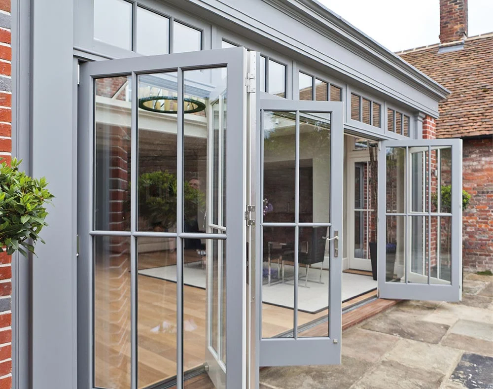 Open bifold doors on orangery extension