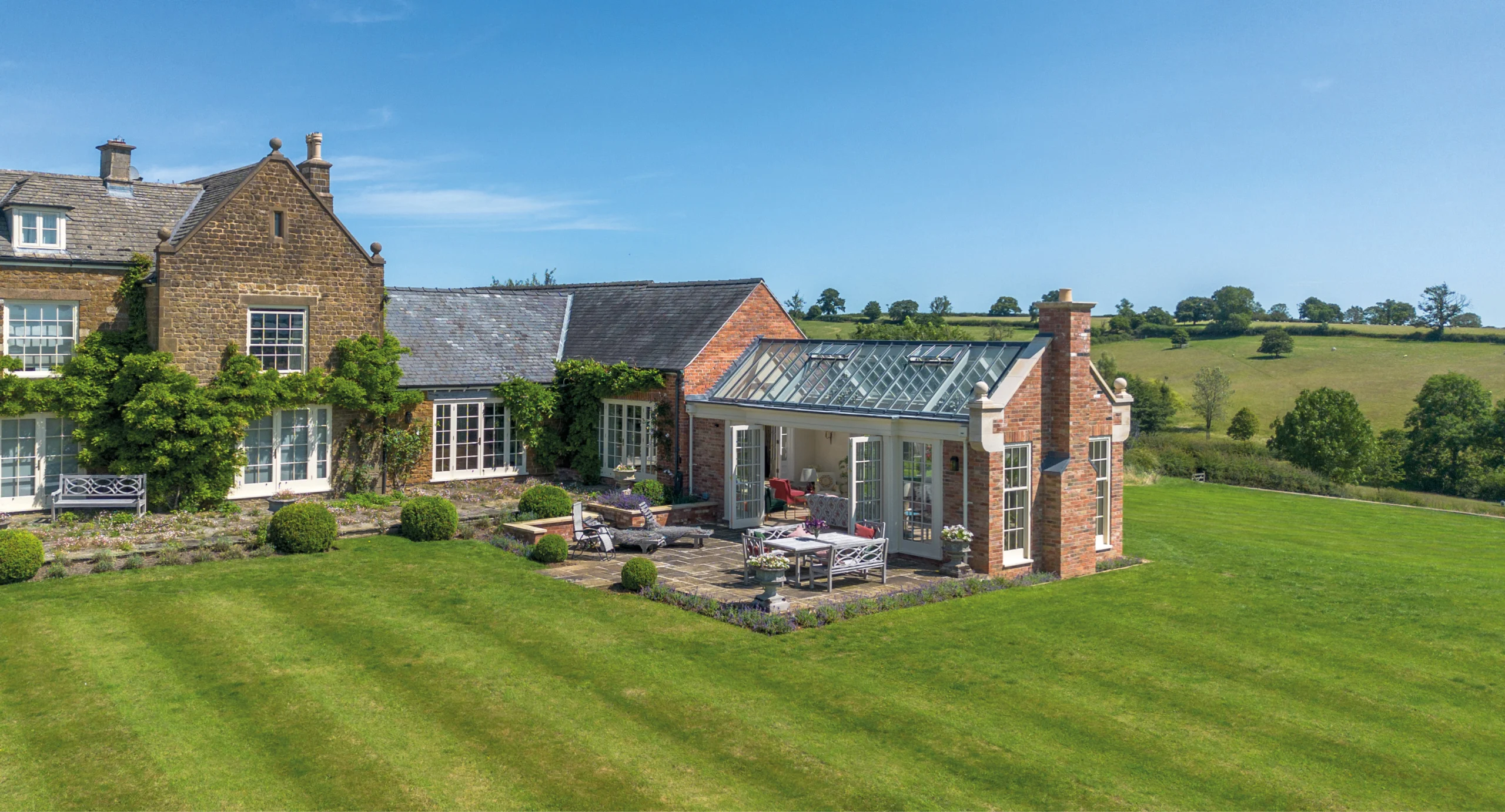 French farmhouse with classical orangery