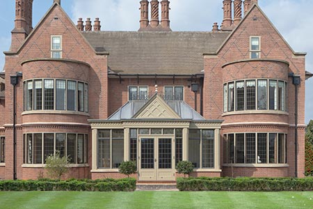 Conservatory with elaborate detail, solid roof and metal windows
