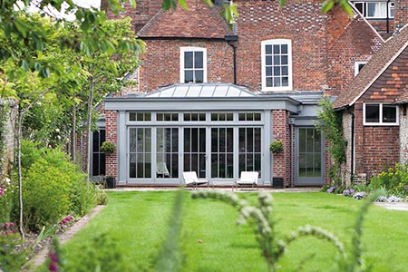 Home living space extended with an open plan orangery