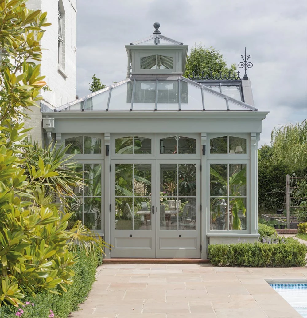 Side angle of double doors on a traditional garden room