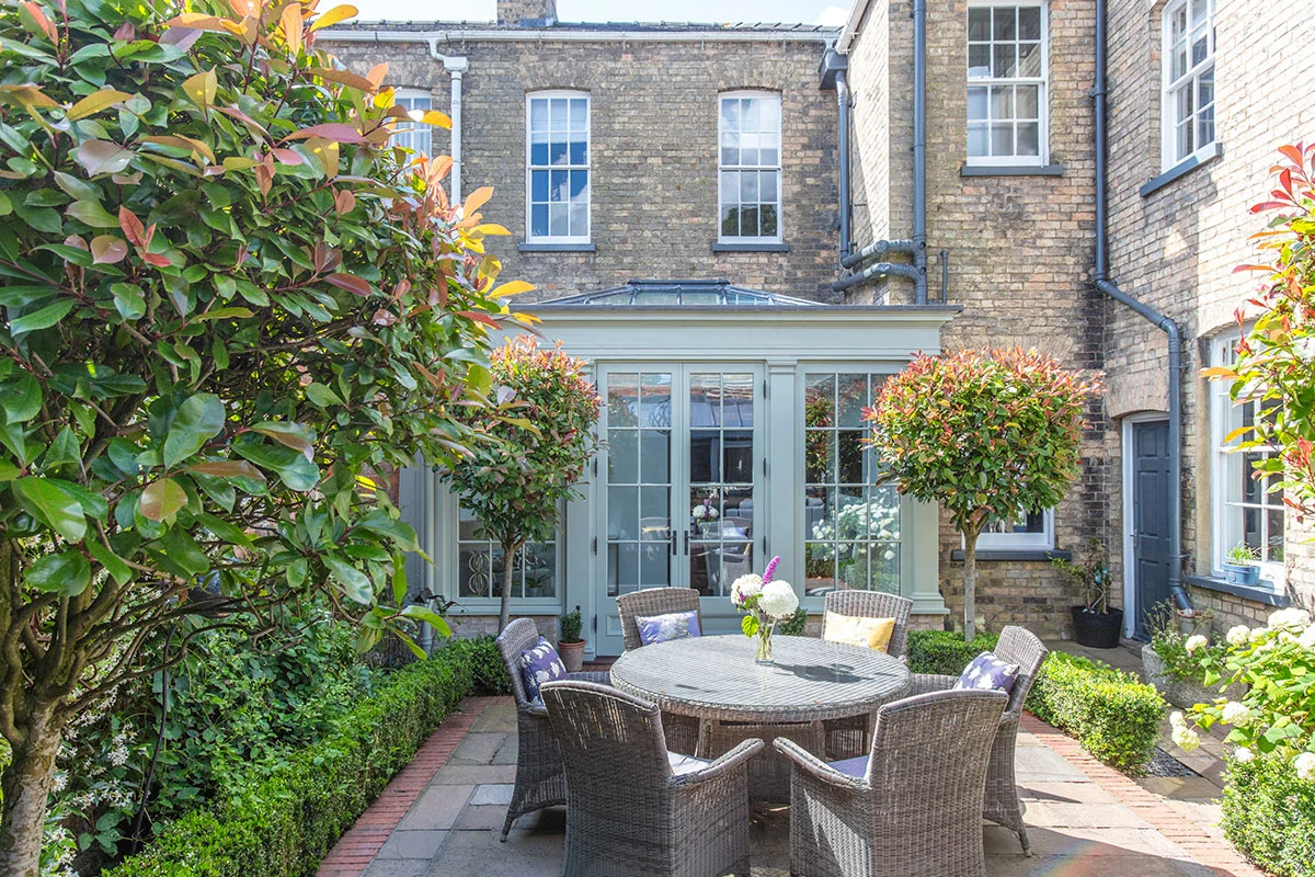 small townhouse orangery with a rear courtyard