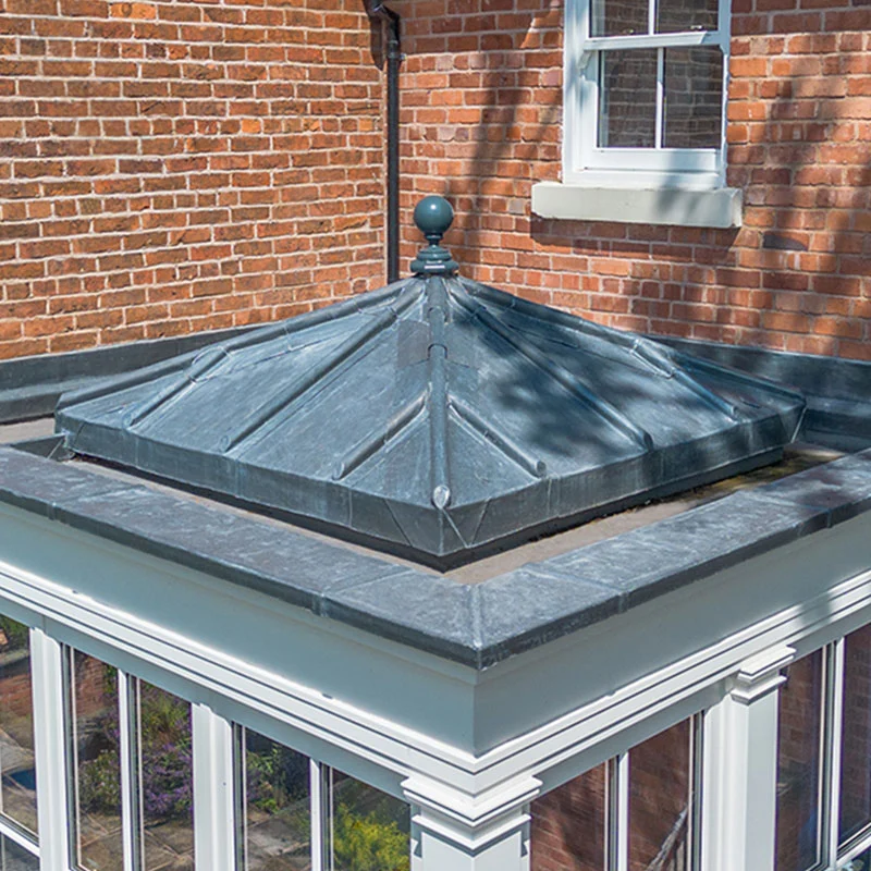 Dining room conservatory with solid roof