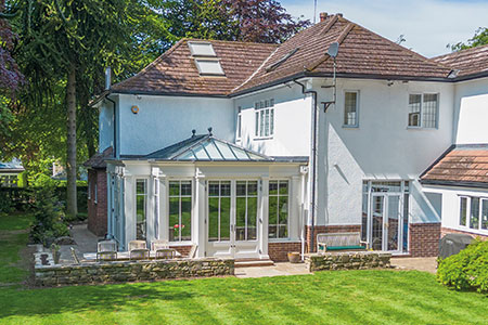 Residence with orangery, bronze screens and bespoke interiors