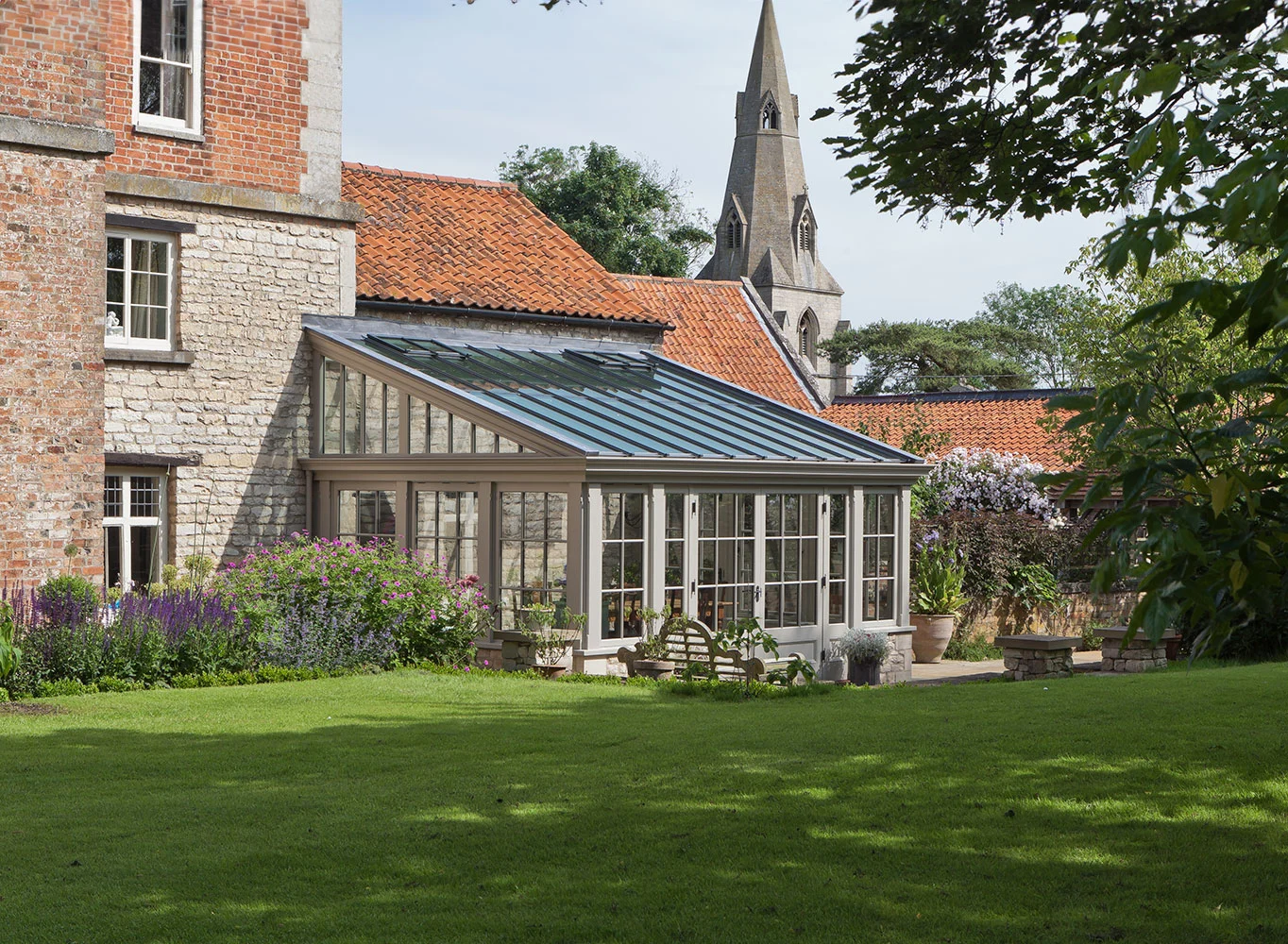 Lean-to conservatory in a small village